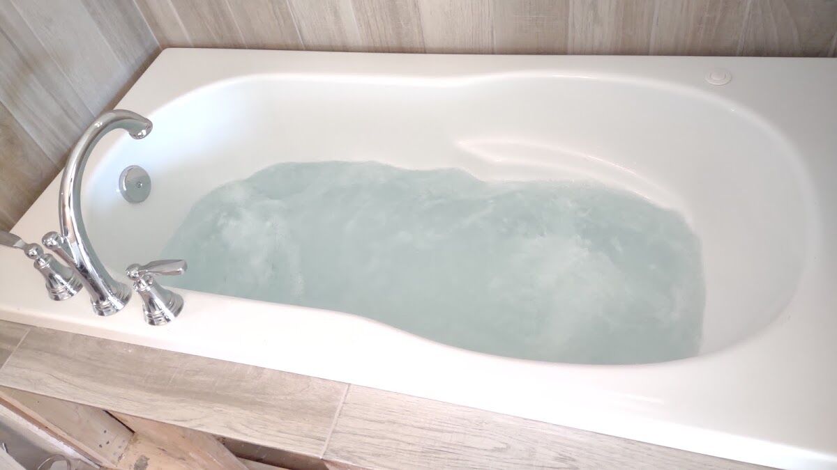 Jetted bathtub installation photographed on an A & B Rooter job
